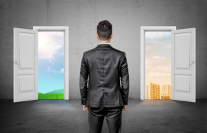 Man standing before 2 doors showing two different life paths