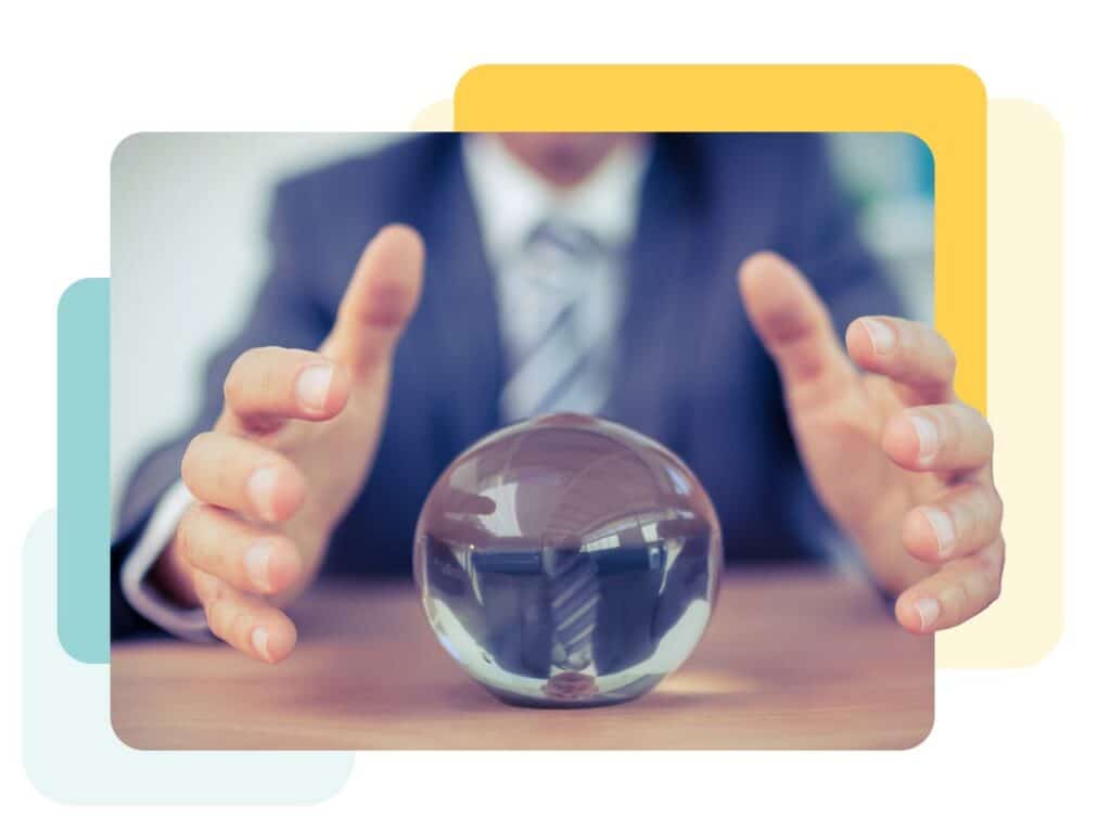 Businessman's hands waving around a crystal ball