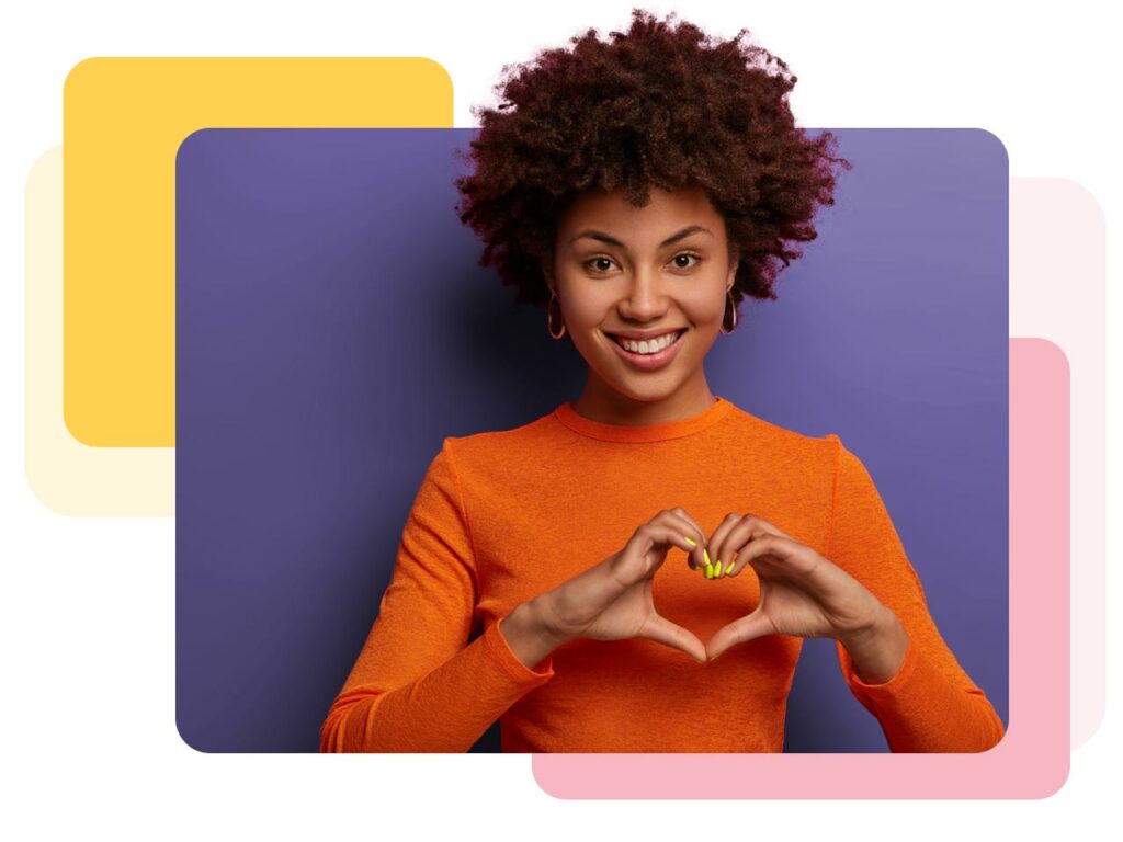 Woman making a heart shape with her hands